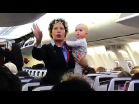 Southwest Flight Attendant Calms Fussy Baby