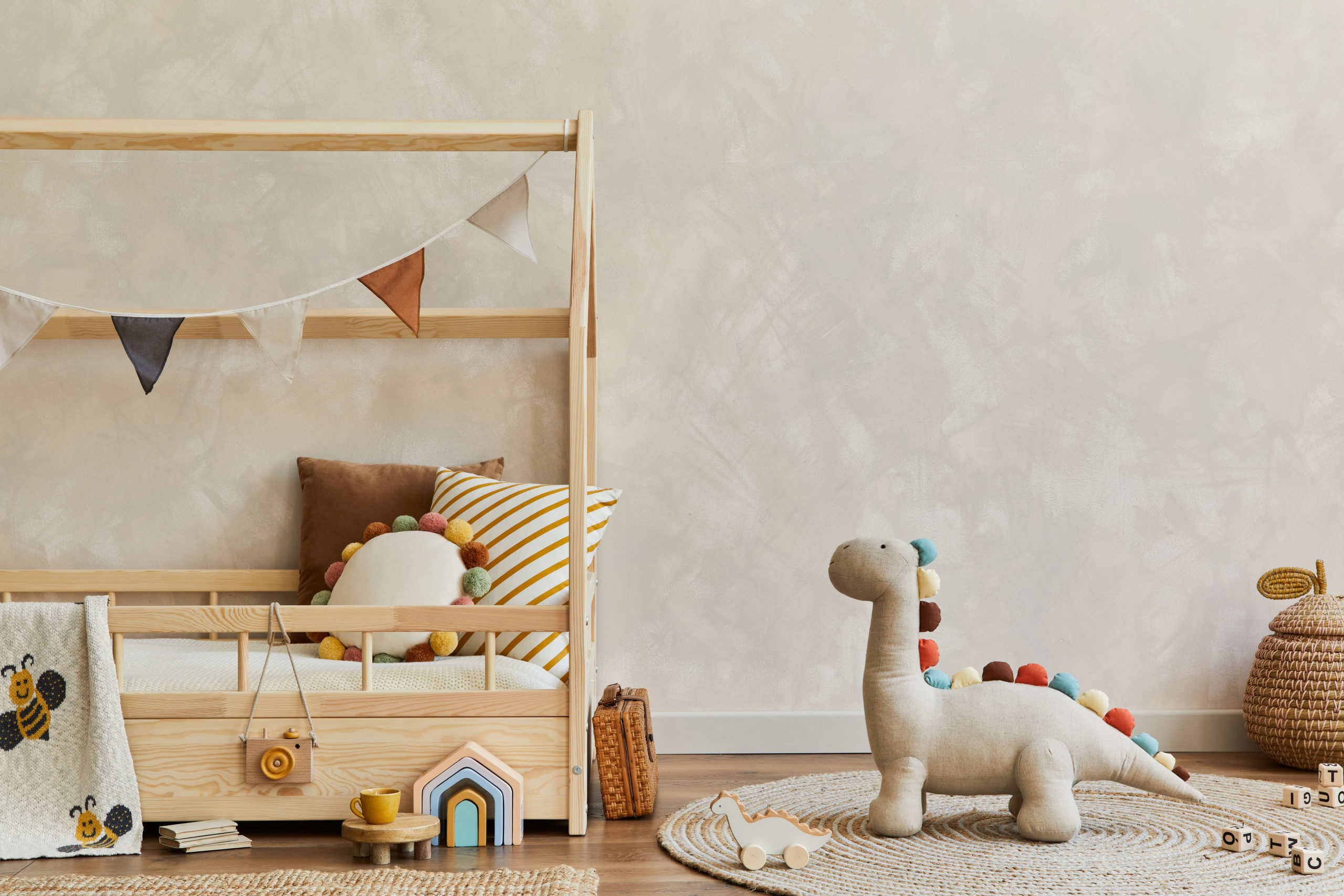 Stylish composition of cozy scandinavian child’s room interior w