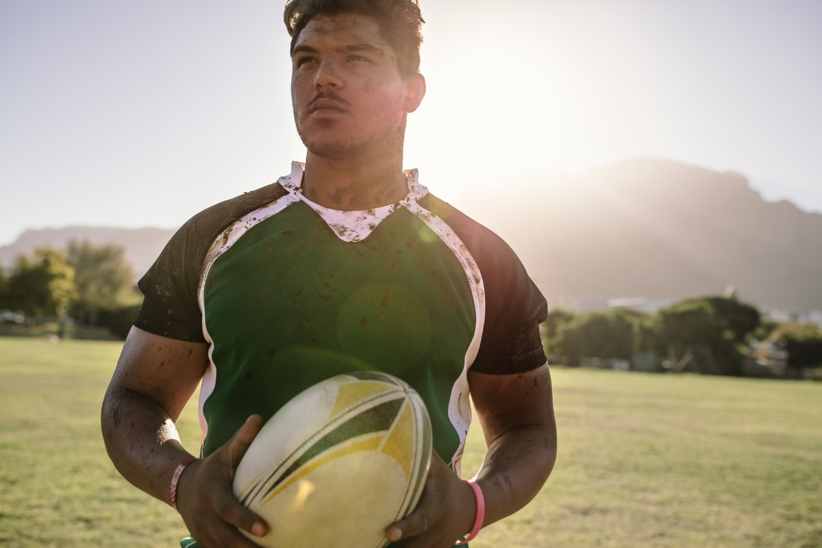 Match de rugby en cours avec un chronomètre visible